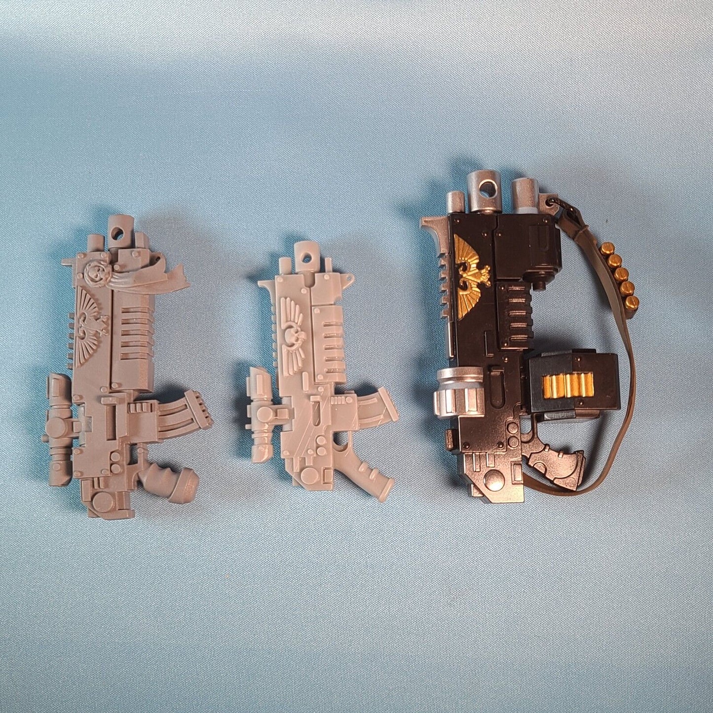 Comparison of Space Marine McFarlane Toys - Fantasy World Games Boltgun with Scope - Bandai auto Bolt Rifle and auxiliary grenade launcher