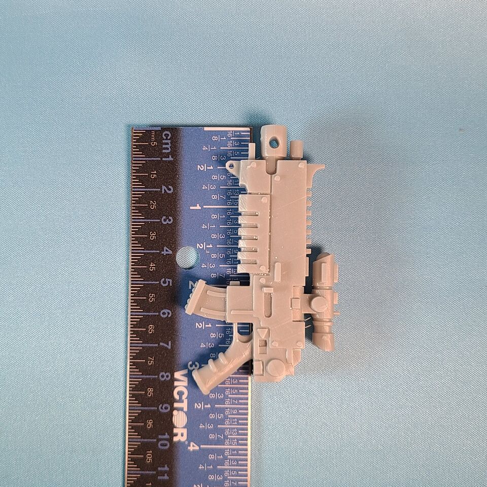 Measurement of the Fantasy World Games Boltgun with Scope compatible with McFarlane Toys space marines - with ruler