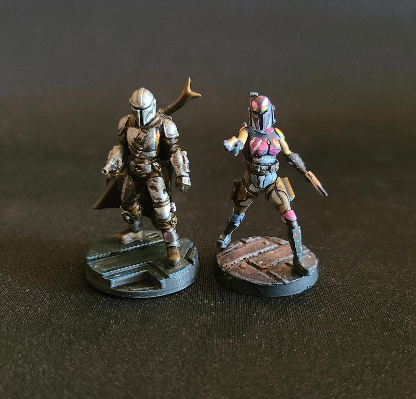 The Mandalorian posed with Blaster Forward Bounty Hunter with Sabine Wren is Compatible with Star Wars Legion painted by MLBStudios