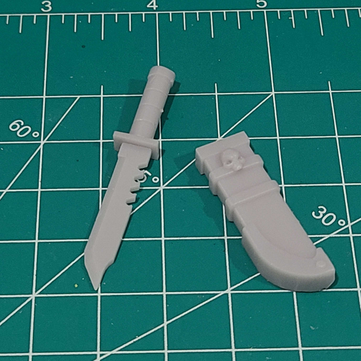 Custom resin combat knife with optional sheath compatible with McFarlane Toys 7-inch 1:12 scale armored action figures.