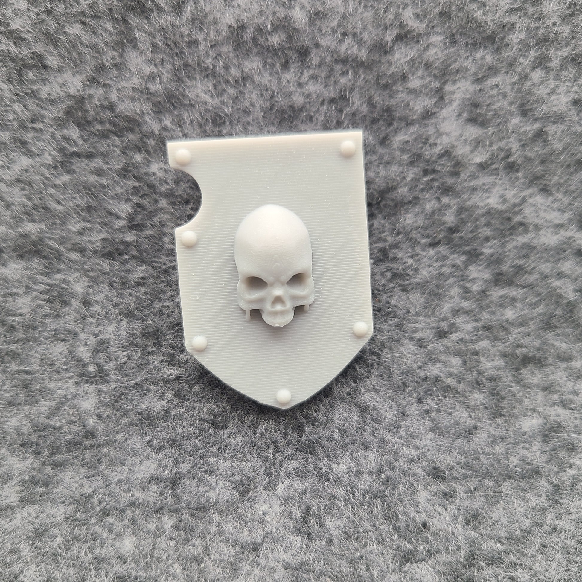 Bone Reapers Warrior Order Shoulder Pad Shield Ver. 01 Reverse resin heraldry upgrade for 1:12 scale armored action figures by Fantasy World Games.