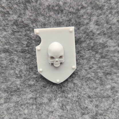 Bone Reapers Warrior Order Shoulder Pad Shield Ver. 01 Reverse resin heraldry upgrade for 1:12 scale armored action figures by Fantasy World Games.