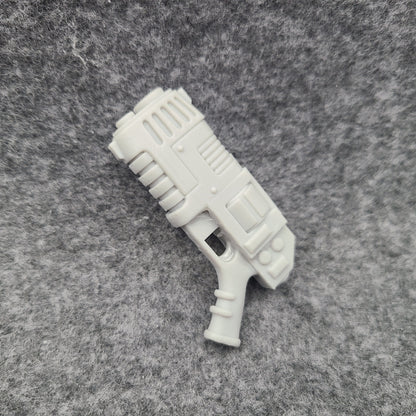 Custom resin plasma pistol revolver compatible with McFarlane Toys 7-inch 1:12 scale armored action figures.