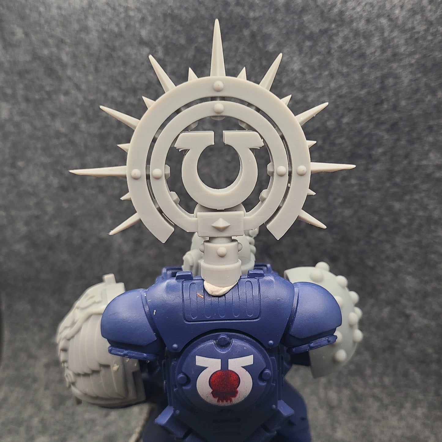 Custom resin Ultra Warrior Order Iron Halo with icon backpack accessory compatible with McFarlane Toys 7-inch 1:12 scale armored action figures.