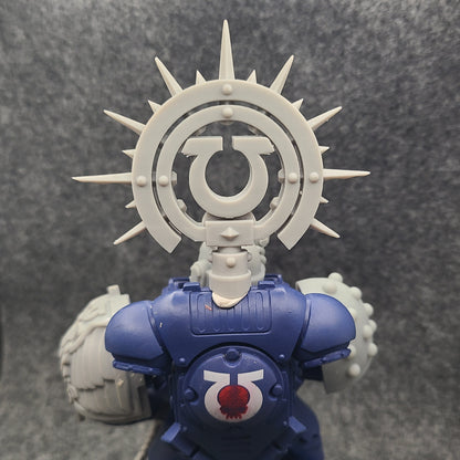 Custom resin Ultra Warrior Order Iron Halo with icon backpack accessory compatible with McFarlane Toys 7-inch 1:12 scale armored action figures.